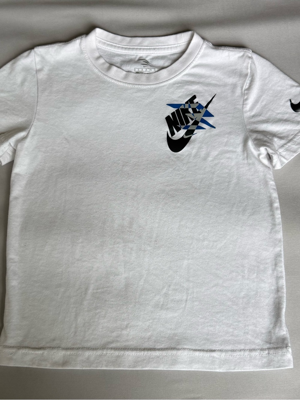 Nike White Short-Sleeve Tee with Black and Blue Logo